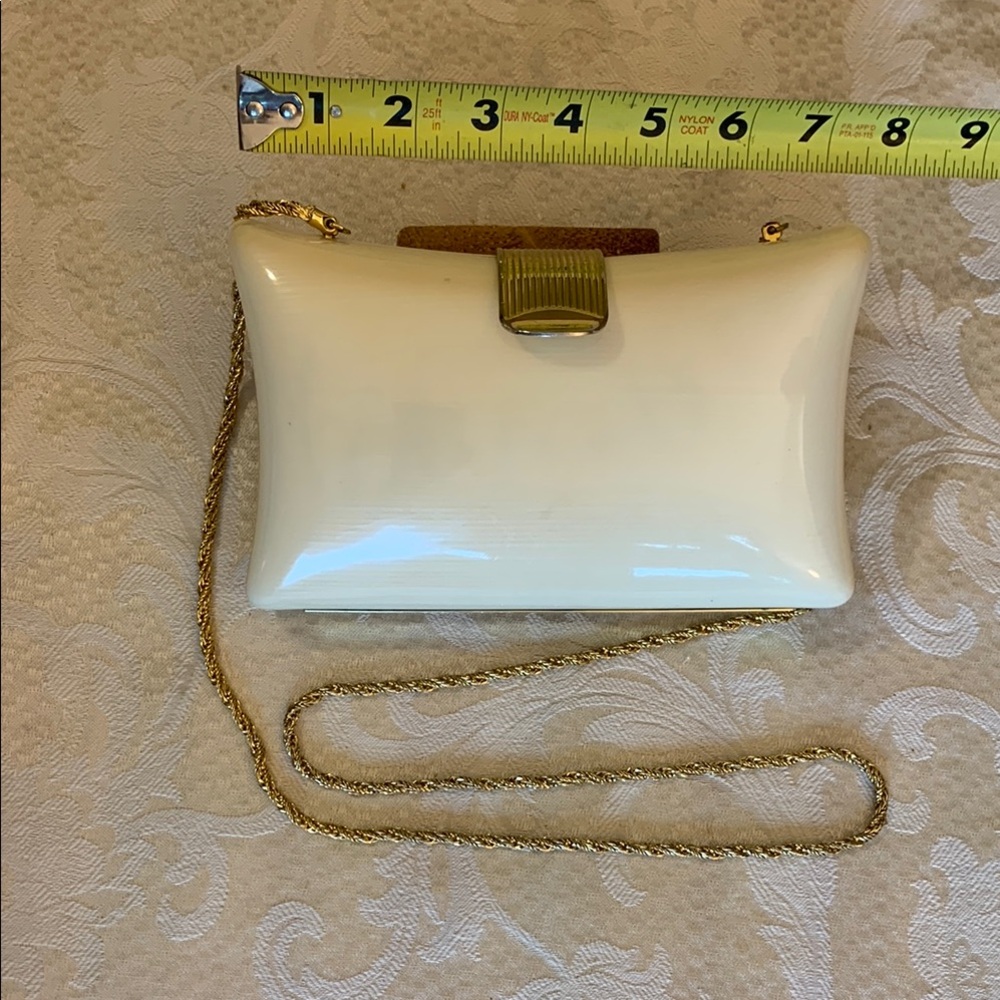 Elegant Cream Clutch with Gold Chain